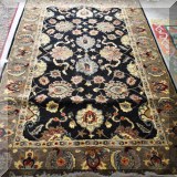 R33. Hand tufted wool rug. Made in India. 5' x 8'